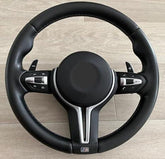 BMW F10 Steering Wheel featuring ergonomic design and premium materials for enhanced driving control.